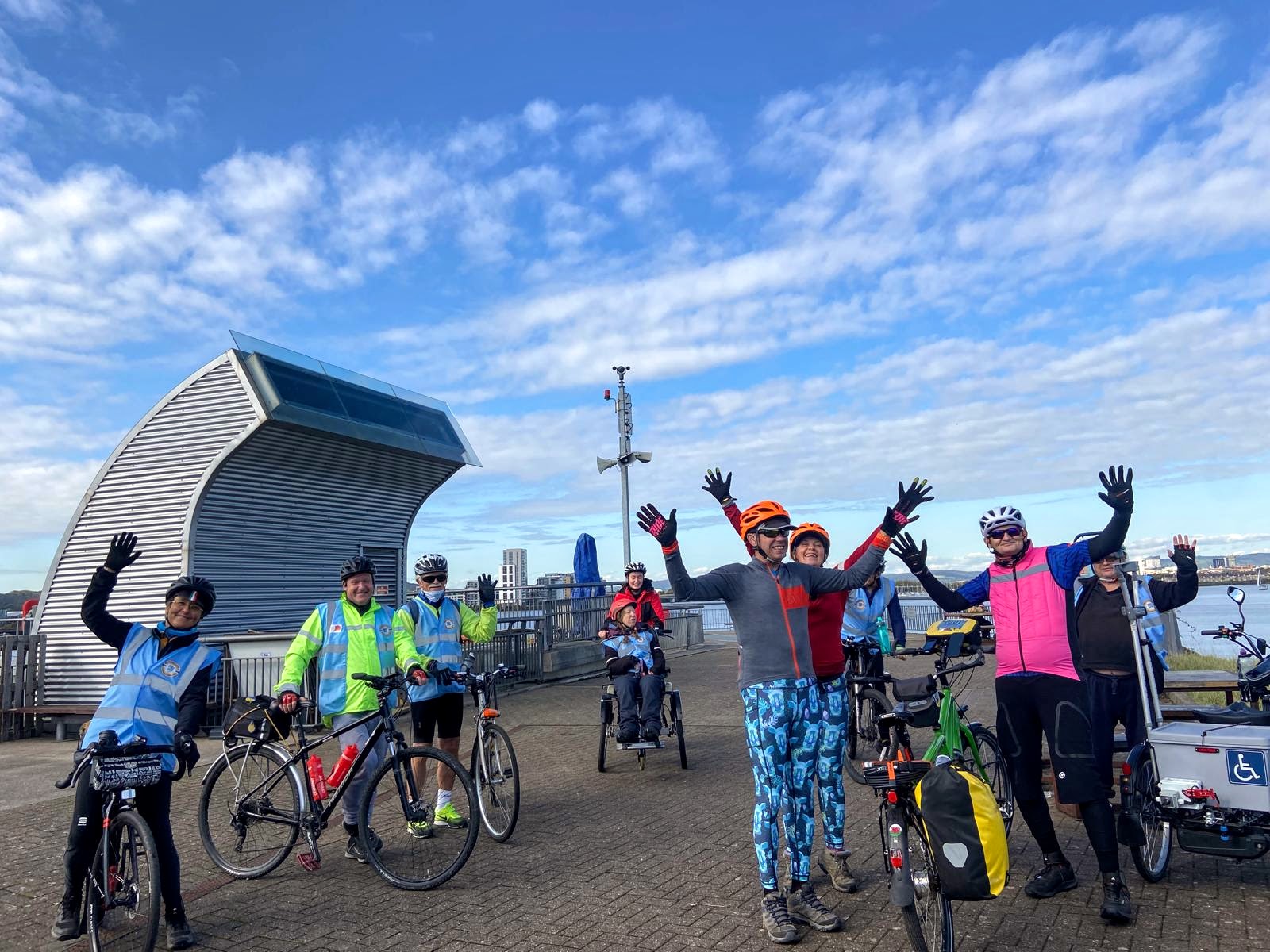 Wheels for Tenacious cyclists riding along a riverside path in South Wales during the Barry to Gloucester event, October 2024