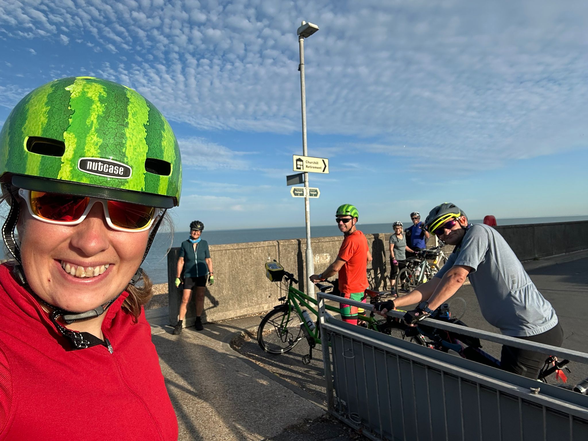 Members of Wheels for Tenacious cycling the Cantii Way route in Kent, September 2025, with the Kent countryside behind them