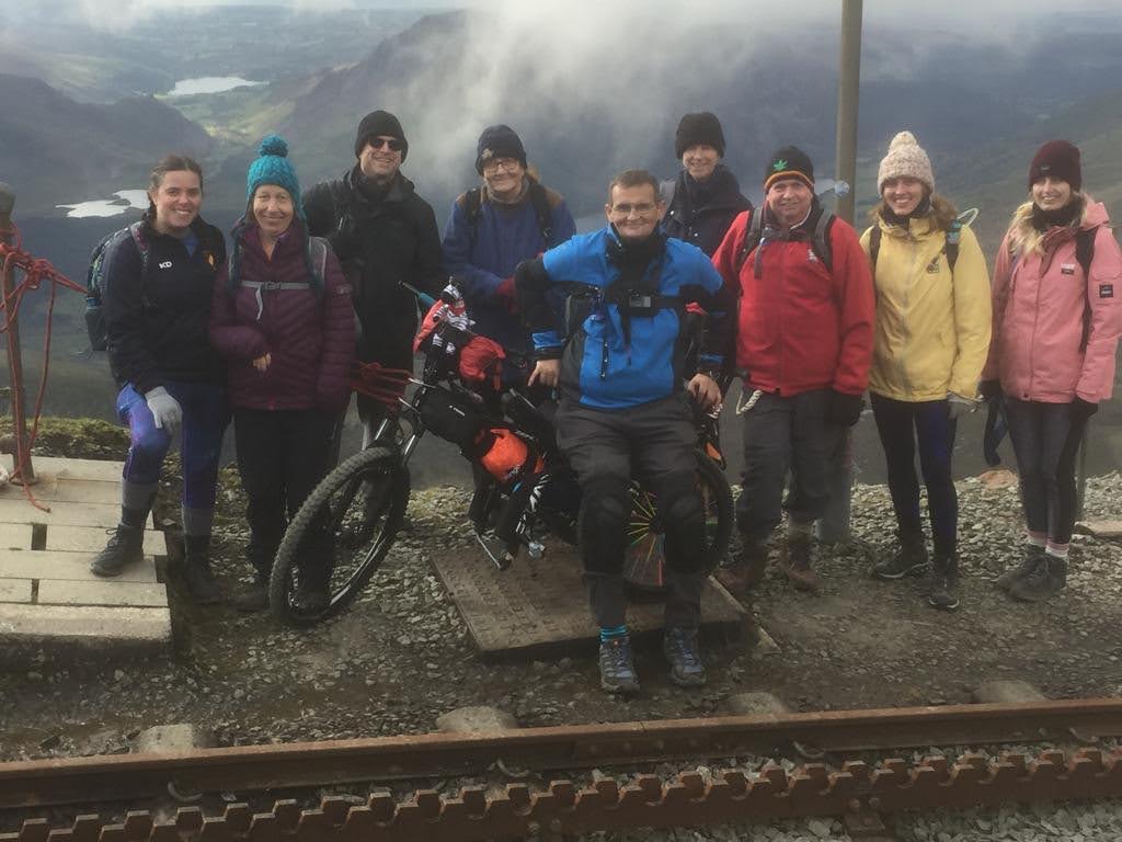 David Bainbridge and the mixed-ability team on the Llanberis Path on Snowdon during the Pulling Together Up Snowdon challenge, September 2022